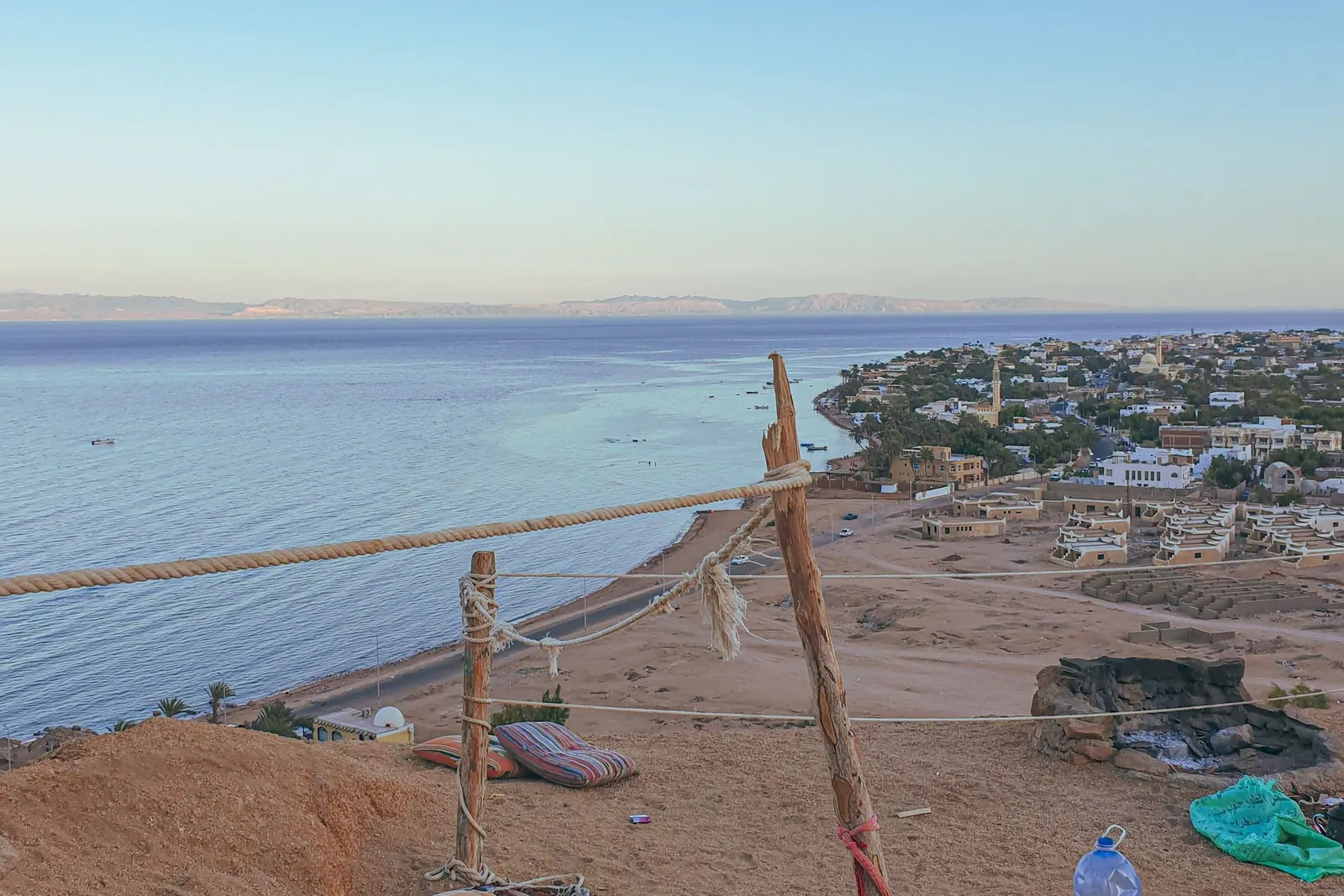 Turquoise Red Sea water beside a sandy Egyptian shoreline